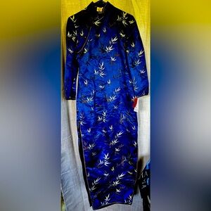 Heavy silk Asian style dress. Size small. High slits both sides.